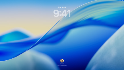 Three Mac models facing forward, 16-inch MacBook Pro in Silver on the left with Phone app on screen showing recent contacts, 24-inch iMac in Blue in centre, macOS Tahoe 26 wallpaper on screen, and 13-inch MacBook Air in Midnight on the right, screen shows Spotlight Search over the desktop with Liquid Glass versions of the Dock and various widgets such as Calendar, Clock and Weather