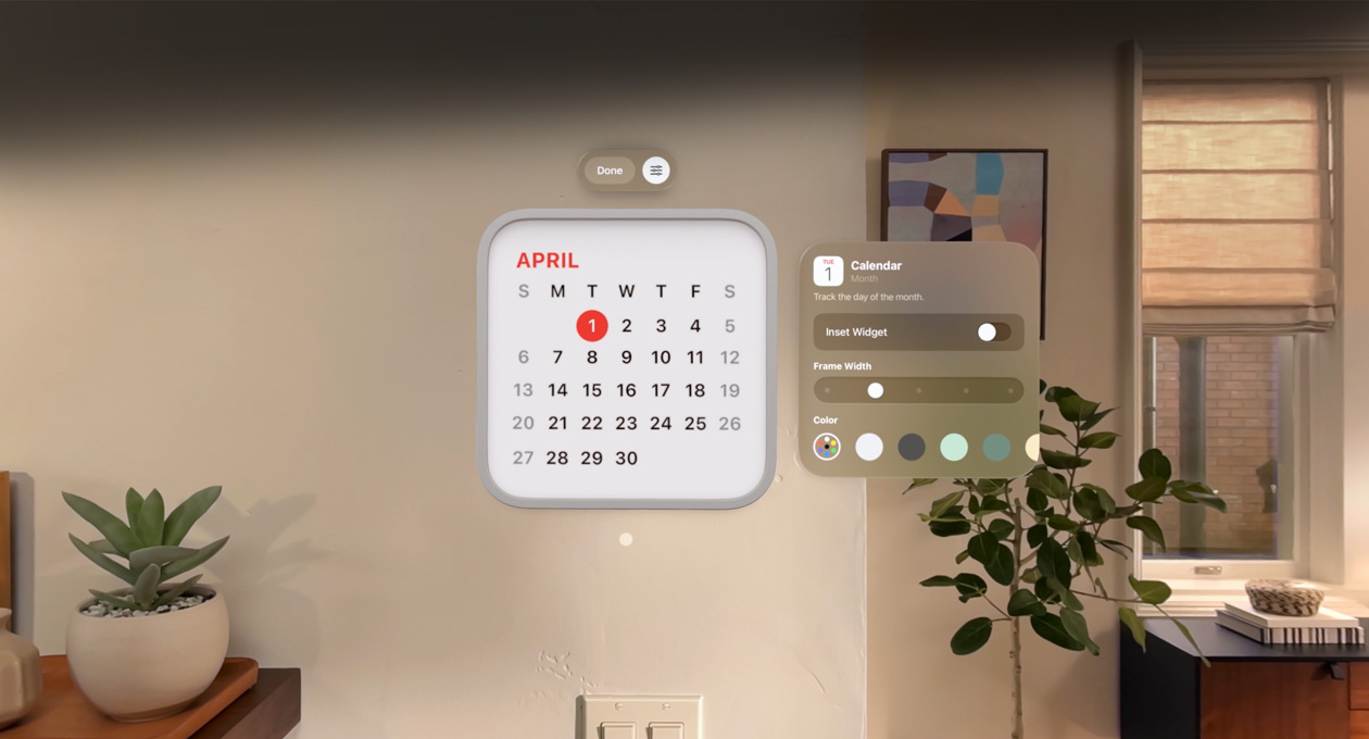 Calendar widget reading: 1  April floats on wall, reminder widget above, personalisation options to change frame thickness and colour to right