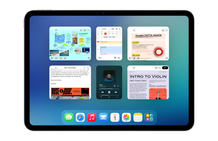 iPad, nằm ngang, màn hình hiển thị nhiều ứng dụng như ứng dụng Lịch và Nhạc trong sáu cửa sổ xếp thành hai hàng để hiển thị các cửa sổ bằng nhau