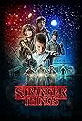 Winona Ryder, David Harbour, Natalia Dyer, Caleb McLaughlin, Millie Bobby Brown, Finn Wolfhard, Charlie Heaton, Noah Schnapp, and Gaten Matarazzo in Stranger Things (2016)