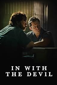 Paul Walter Hauser and Taron Egerton in In with the Devil (2022)