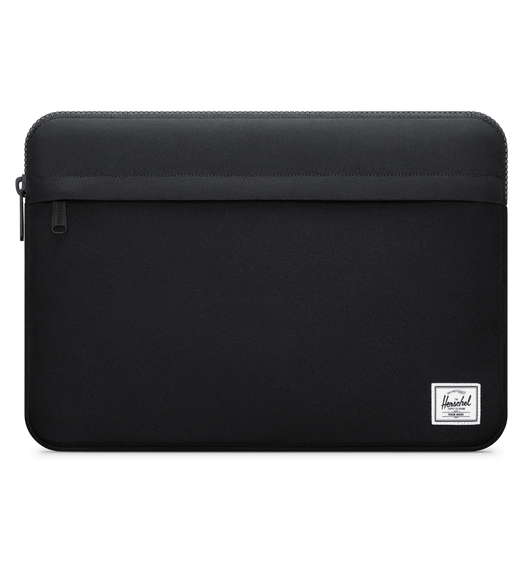 The Herschel Supply Anchor Sleeve for MacBook is fully padded and features a top zipper, a zippered front pocket, and the company logo at lower right