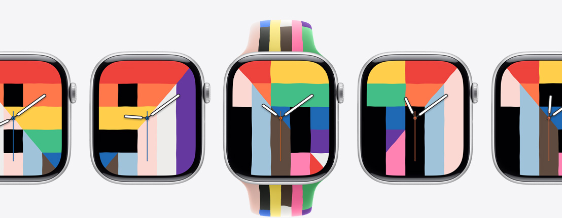 Apple Watch Series 10 devices, Pride Harmony watch face, rectangles, triangles, and trapezoids in solid rainbow hues and other colors form the hour numbers, center watch face connects to Pride Edition Sport Band, six stripes made of thin rectangles in solid rainbow hues and other colors, slightly uneven edges